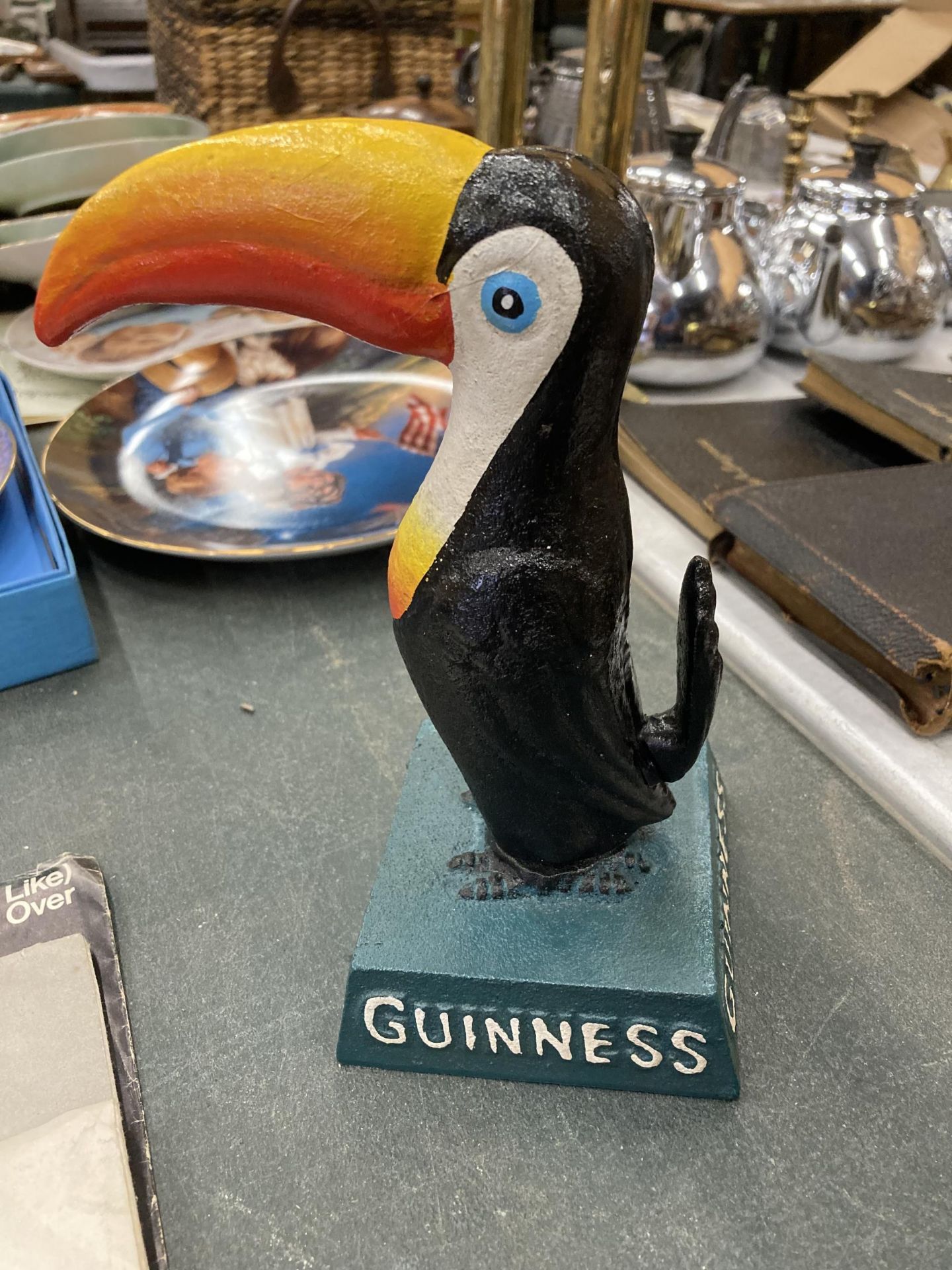 A CAST GUINNESS TOUCAN FIGURE