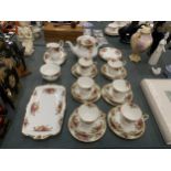 A ROYAL ALBERT 'OLD COUNTRY ROSES' TEASET TO INCLUDE A TEAPOT, CREAM JUG, SUGAR BOWL,SANDWICH AND