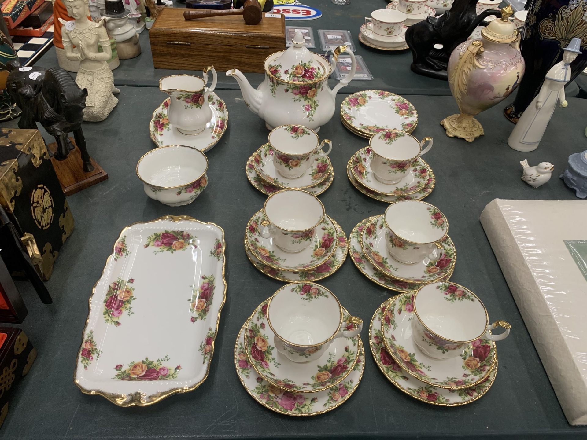 A ROYAL ALBERT 'OLD COUNTRY ROSES' TEASET TO INCLUDE A TEAPOT, CREAM JUG, SUGAR BOWL,SANDWICH AND