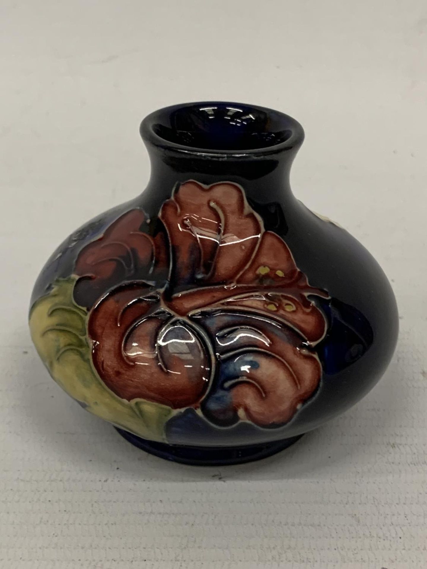 A MOORCROFT BLUE HIBISCUS VASE