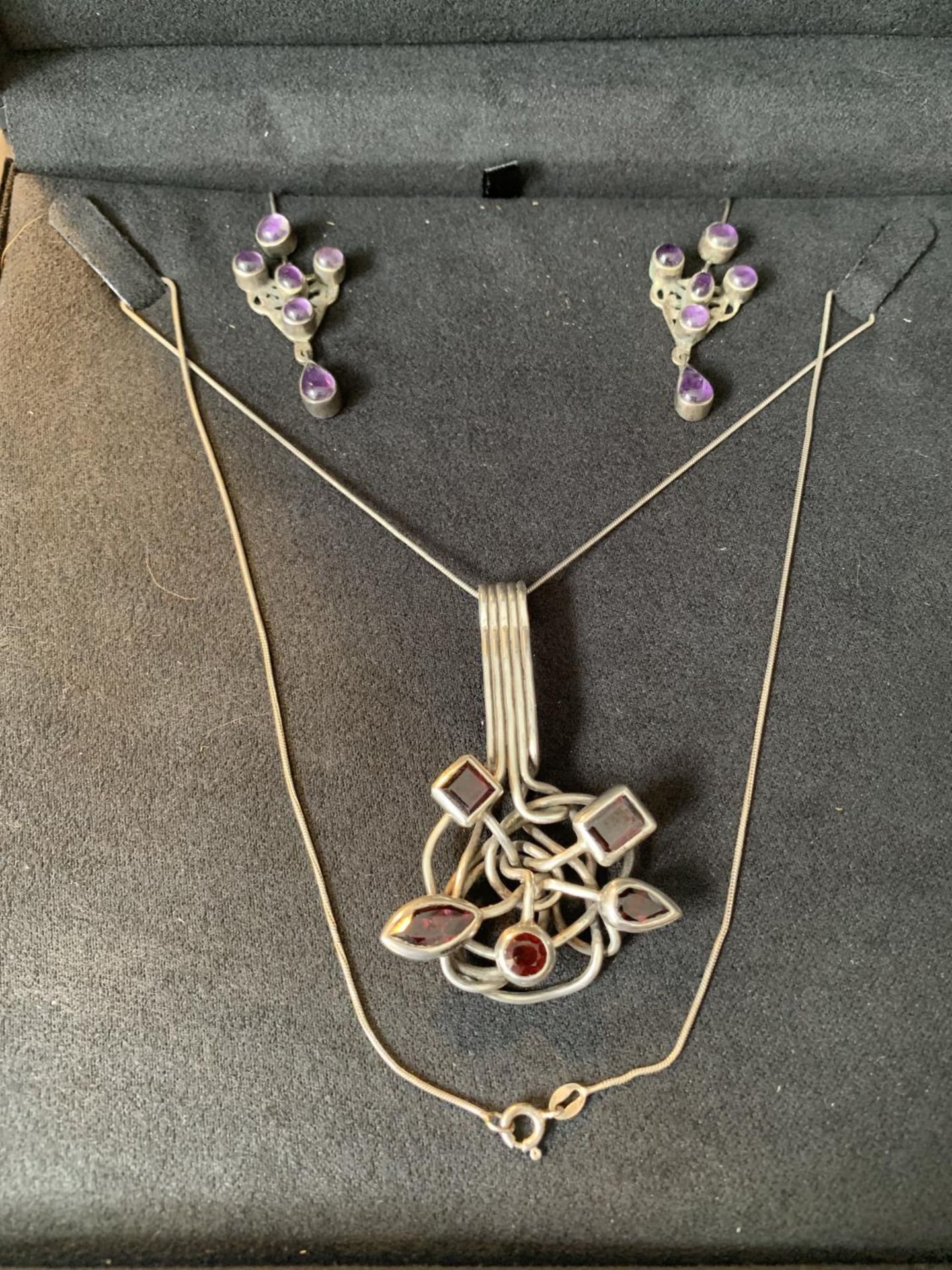 A SILVER DESIGNER OLGA NECKLACE AND EARRING SET IN A PRESENTATION BOX