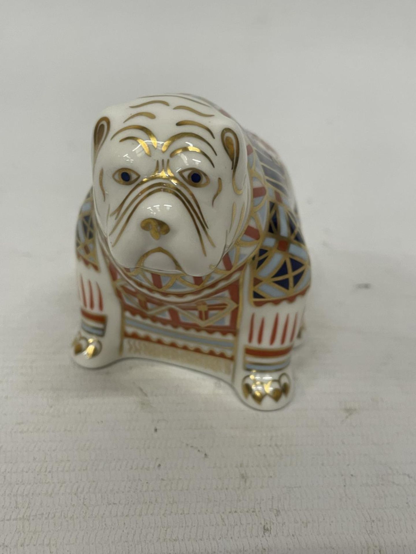 A ROYAL CROWN DERBY BULLDOG PAPERWEIGHT, SILVER STOPPER