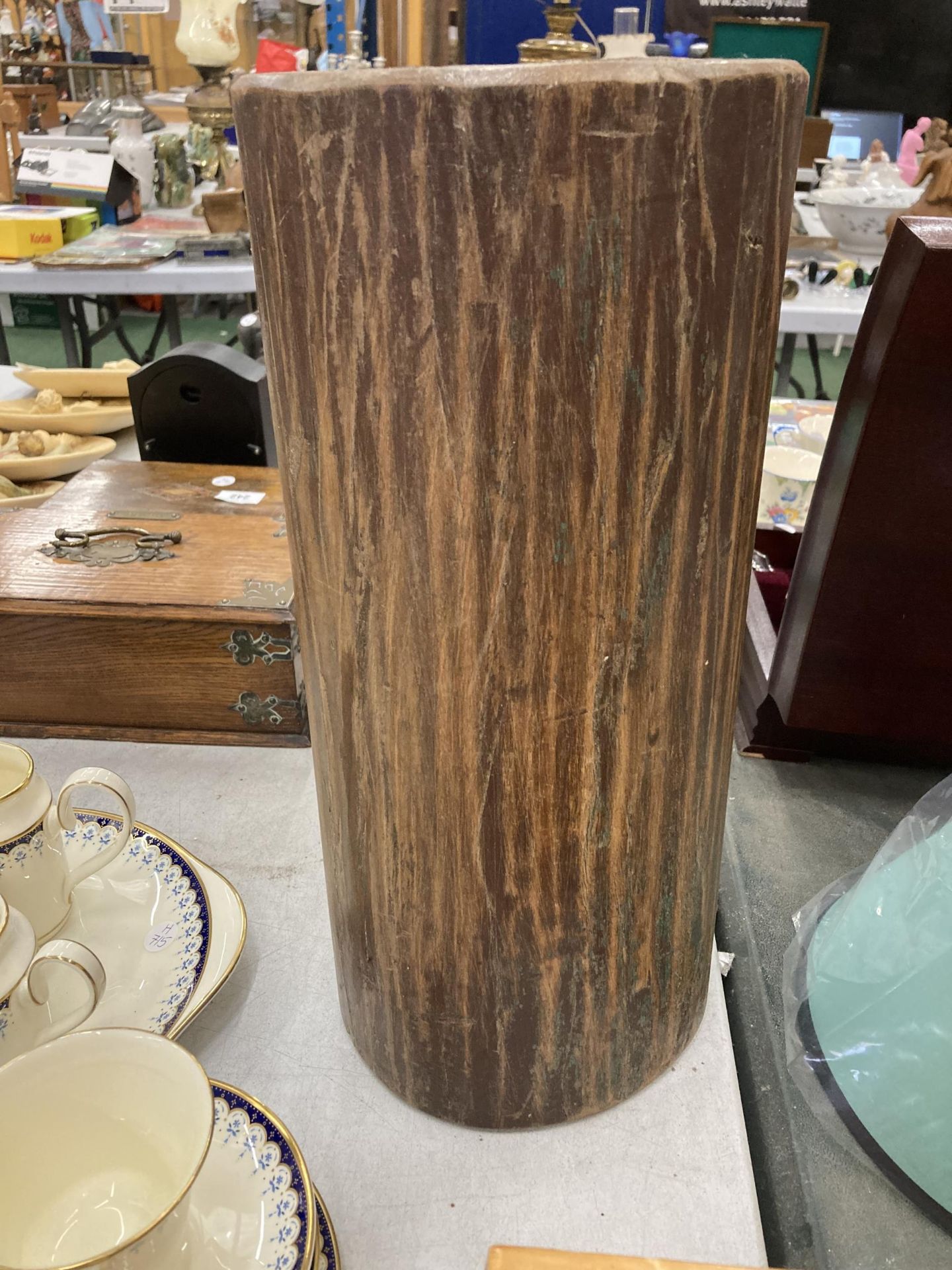 A VINTAGE HARDWOOD CANDLE HOLDER