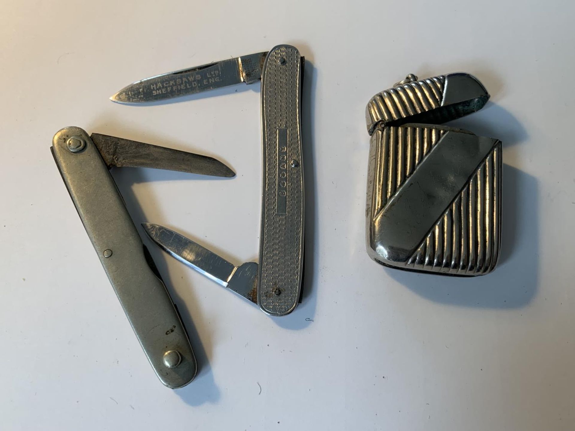 A VESTA CASE AND TWO PEN KNIVES