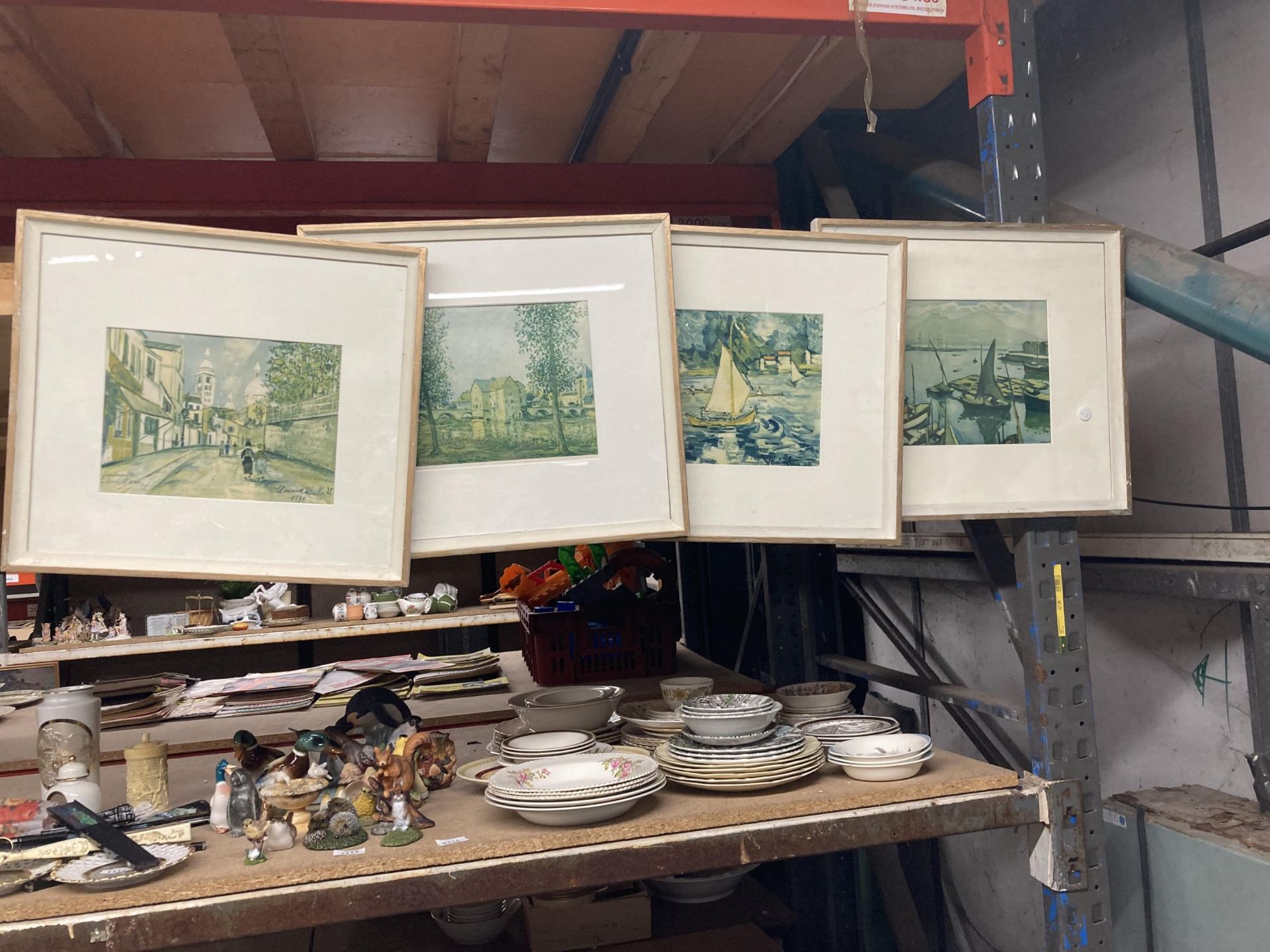 A SET OF FOUR VINTAGE FRAMED PRINTS