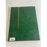 GREEN STOCKBOOK HOUSING A FINE MINT COLLECTION OF BRITISH COMMONWEALTH , GV1 & QE11 ISSUES .