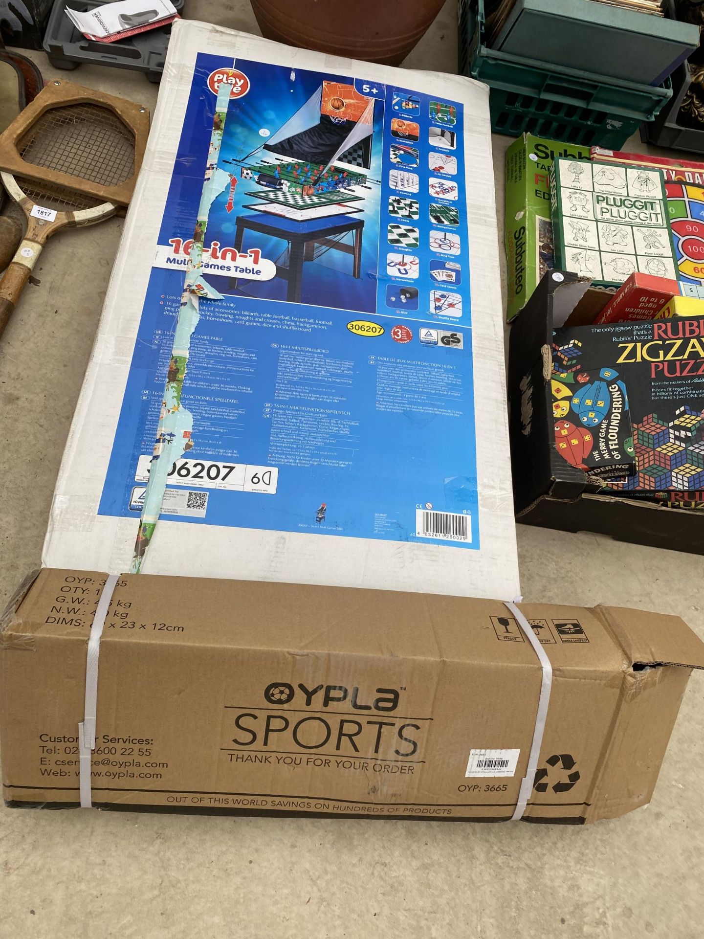 A 16-IN-1 MULTIGAMES TABLE AND A NEW AND BOXED 3-BIKE UNIVERSAL RACK