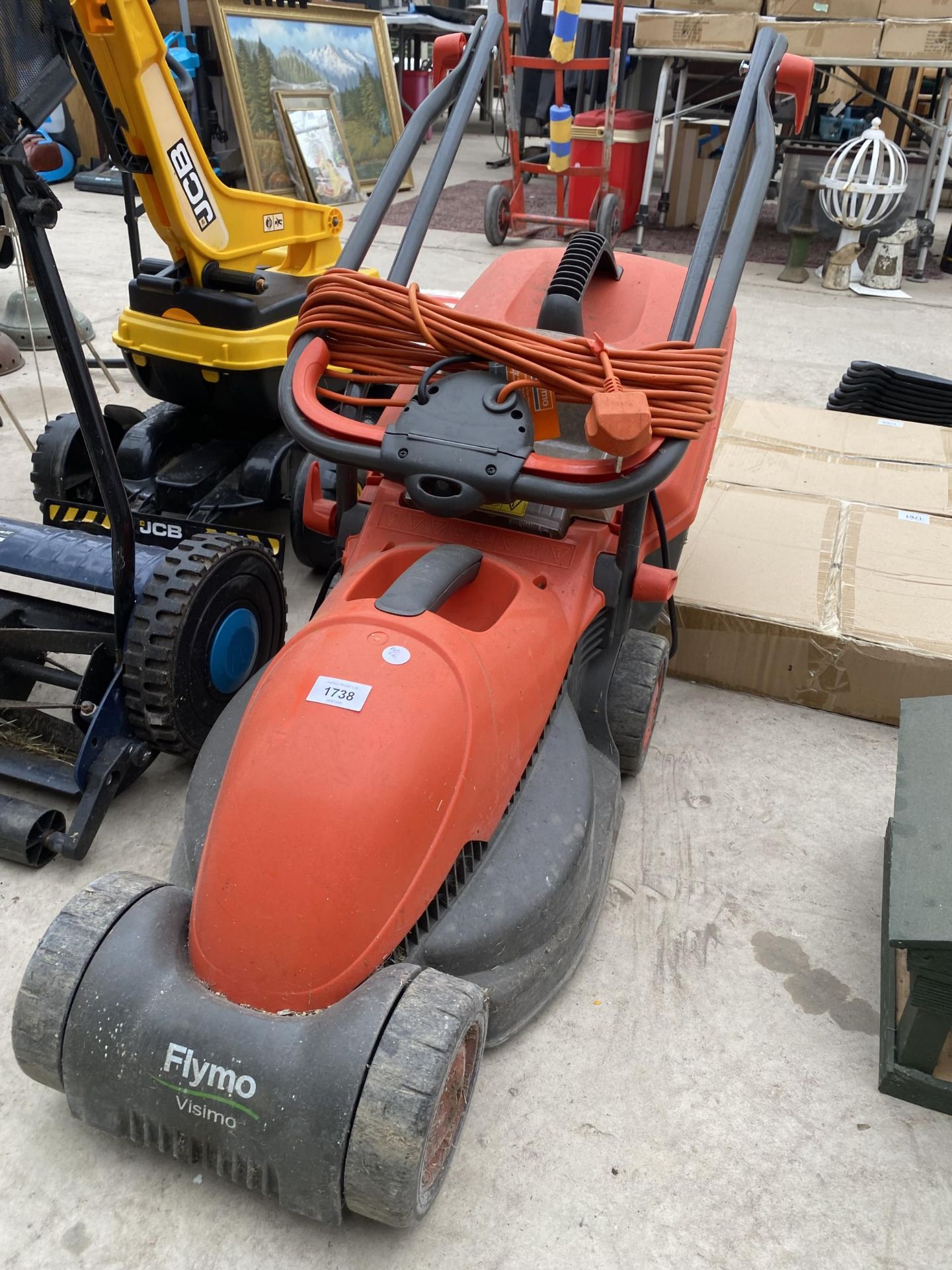 AN ELECTRIC FLYMO LAWN MOWER AND A EINHILL PUSH MOWER - Image 2 of 3