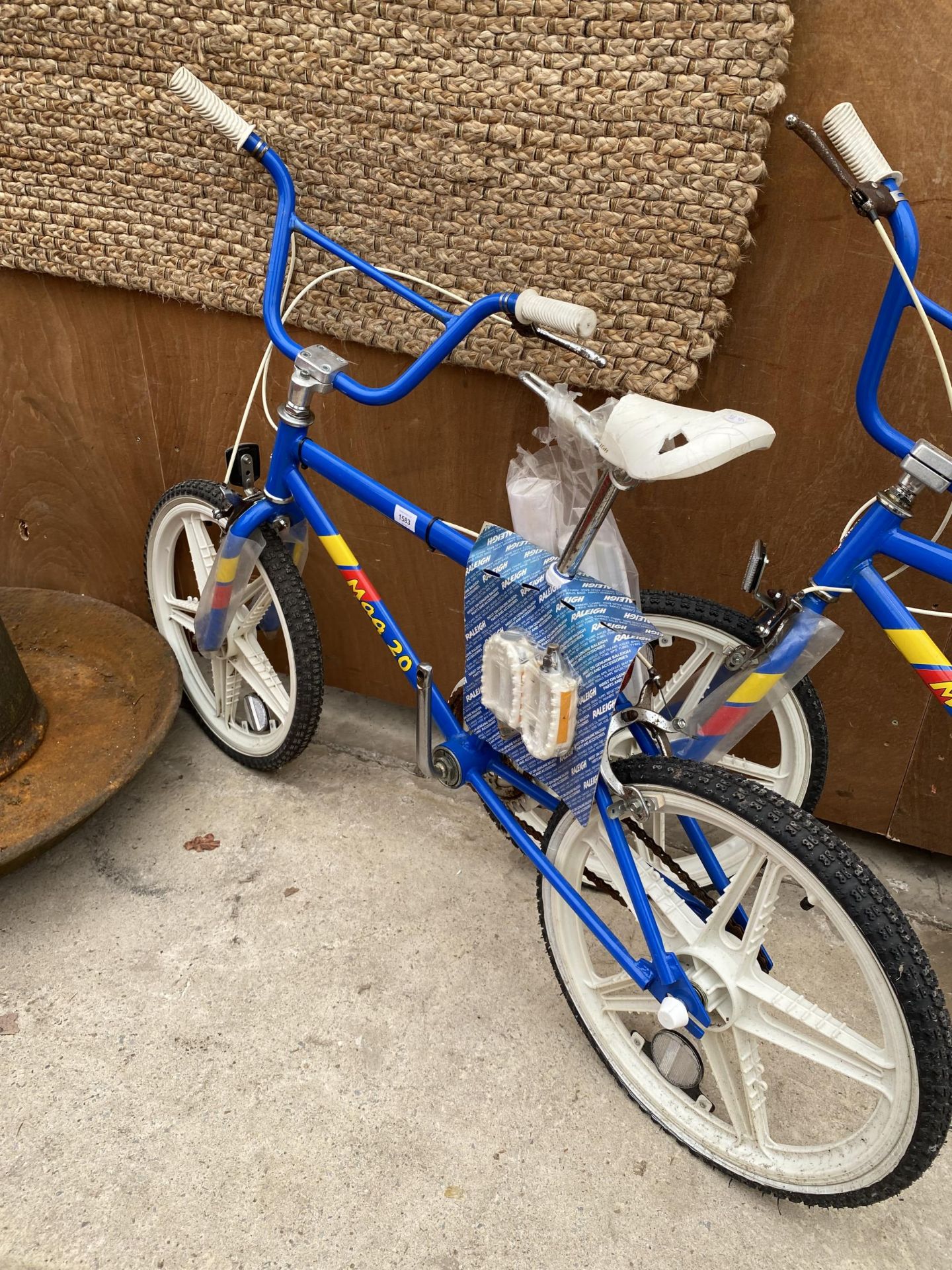 A RETRO OLD STOCK RALEIGH MAG 20 BIKE