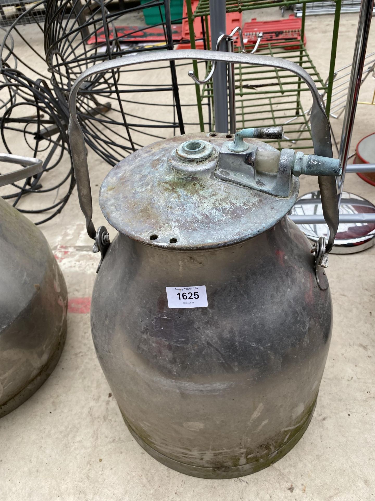 A STAINLESS STEEL MILKING BUCKET/PLANTER WITH LID