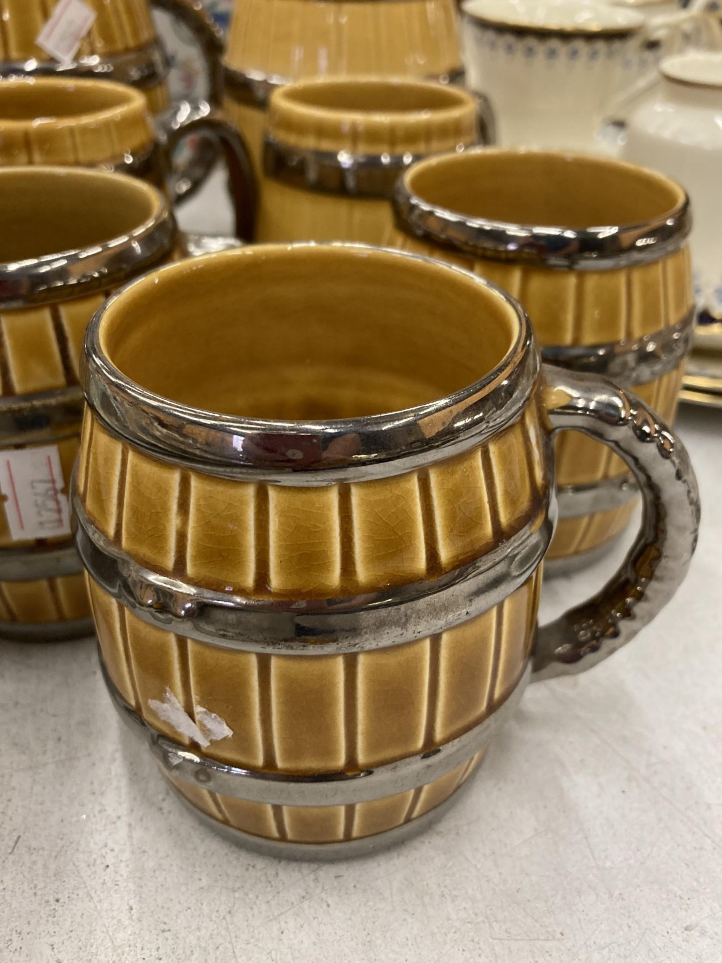 A COLLECTION OF WADE BARREL SHAPED TANKARDS PLUS A JUG - Image 2 of 4