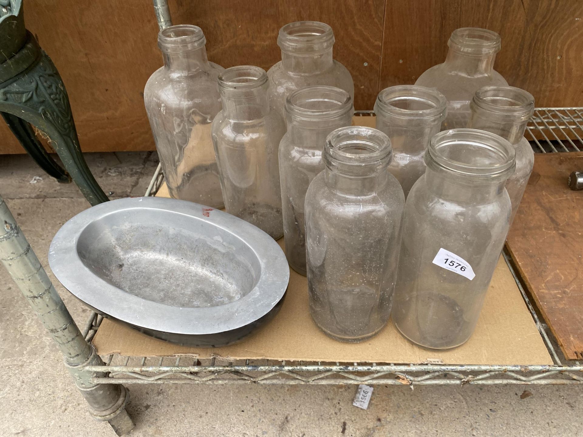 AN ASSORTMENT OF GLASS VESSELS AND A METAL BOWL