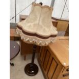 A MID 20TH CENTURY STANDARD LAMP COMPLETE WITH SHADE