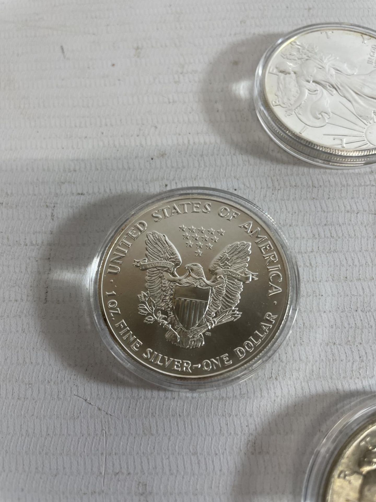 A SELECTION OF 10 USA SILVER $1 COINS , EACH ENCAPSULATED , DATED : 1890, 1922, 1987-8 , 1989 X 2, - Image 2 of 4