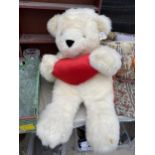 A LARGE AURORA SOFT TEDDY BEAR