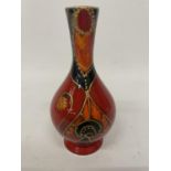 AN ANITA HARRIS TRIAL VASE HANDPAINTED AND SIGNED IN GOLD