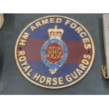 A CAST SIGN 'HM ARMED FORCES, HORSE GUARDS' DIAMETER 23CM