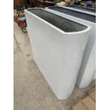 A TALL WHITE FIBRE GLASS TROUGH PLANTER (H:120CM W:133CM D:35CM)