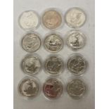 A SELECTION OF 12 UK BRITANNIA £2 SILVER COINS . EACH COIN CONTAINS 1 OUNCE OF PURE SILVER