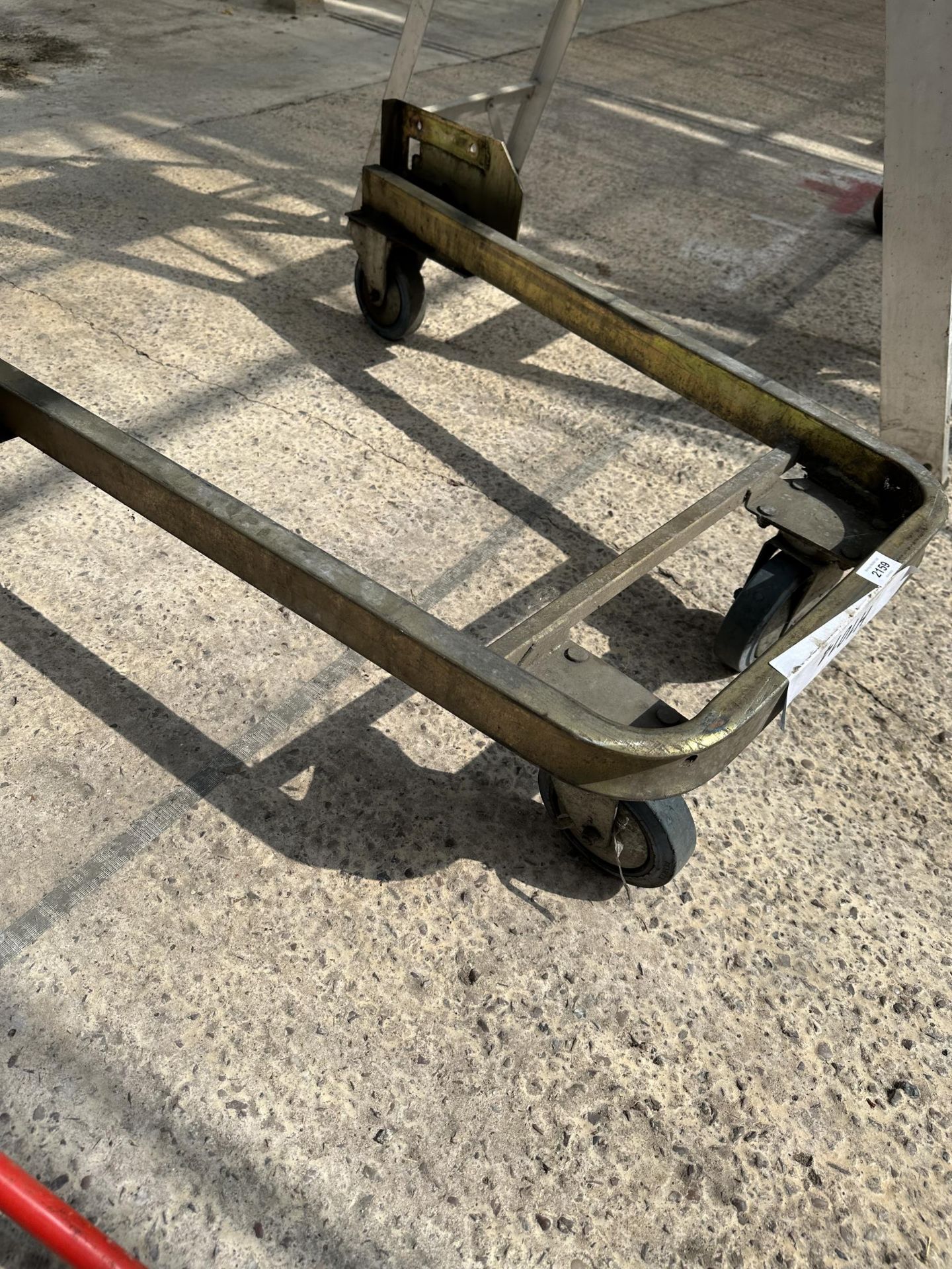 A METAL FOUR WHEELED TROLLEY BASE - Image 2 of 2
