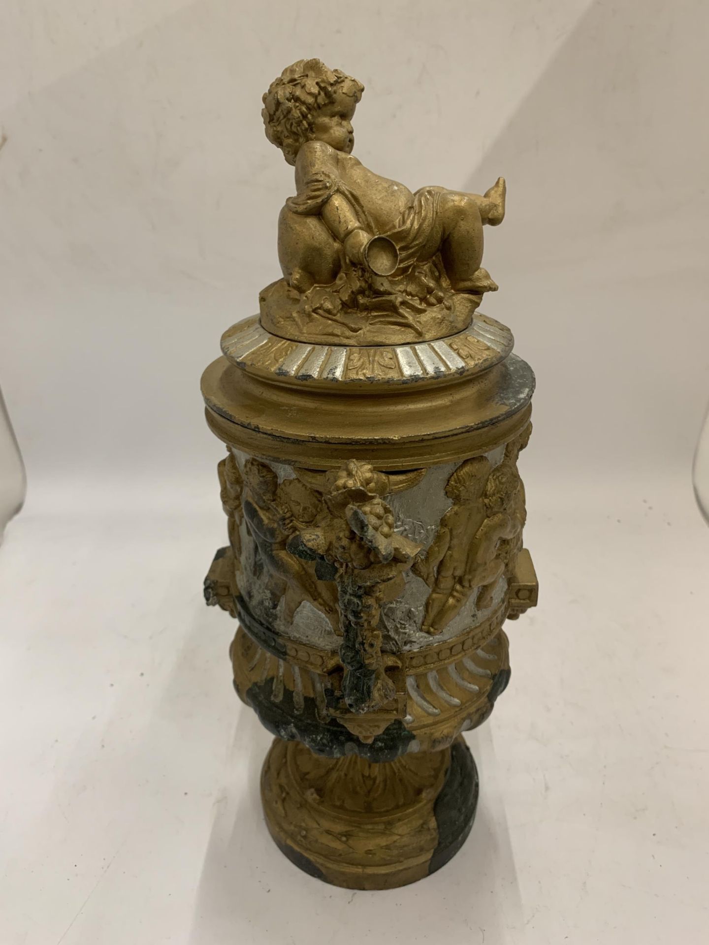 A 19TH CENTURY PEDESTAL URN WITH NEO-CLASSICAL RELIEF DESIGN ON FLUTED BASE WITH CHERUB FIGURAL LID, - Image 3 of 6