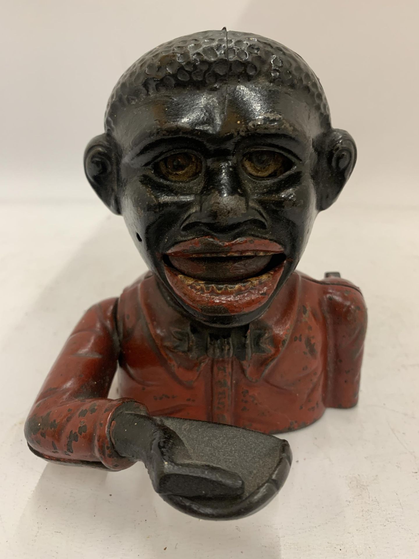 A VINTAGE STYLE 'JOLLY MAN' MONEY BOX