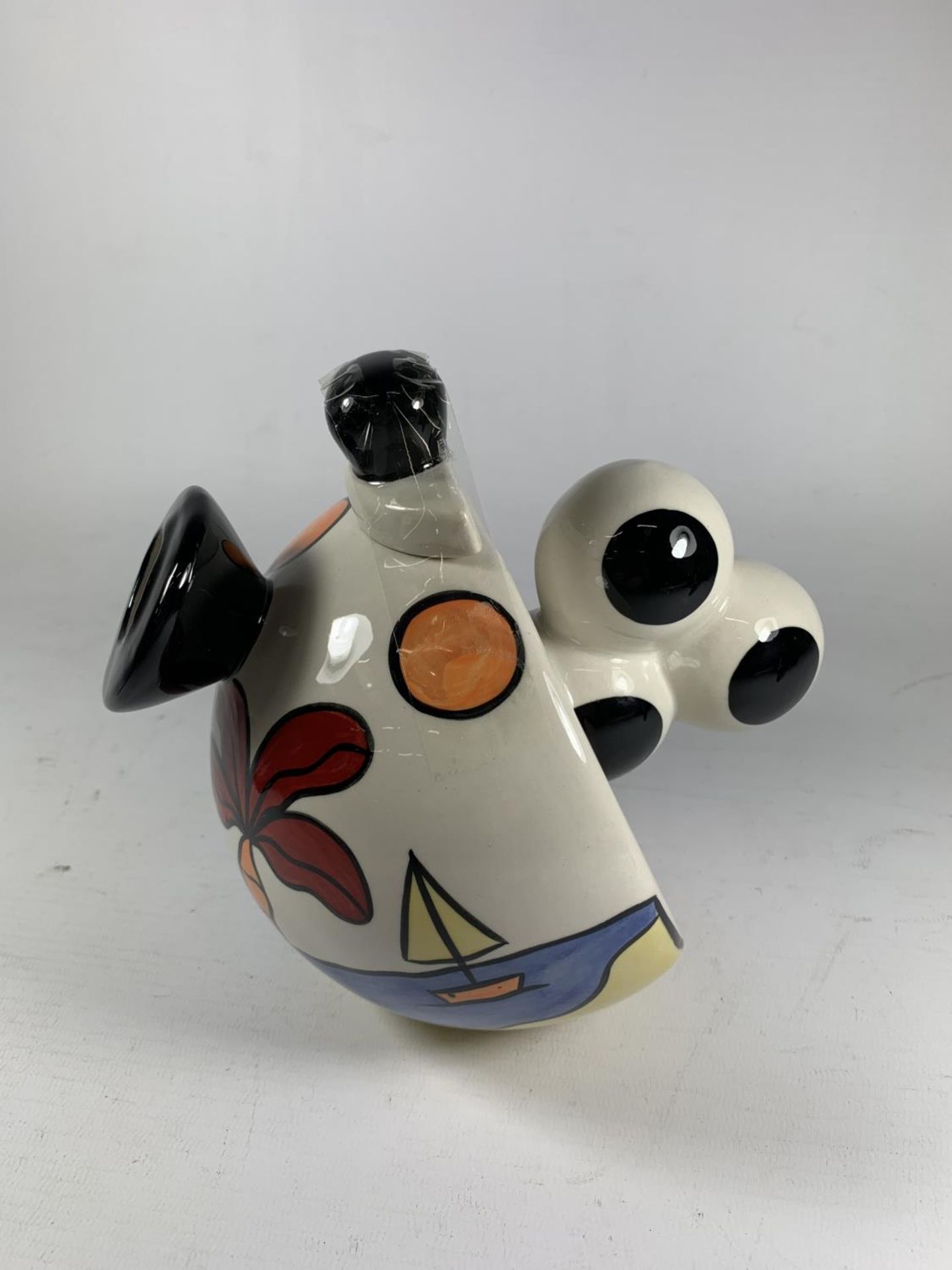 A LORNA BAILEY HANDPAINTED AND SIGNED BALLOON HANDLED TEAPOT TROPICANA