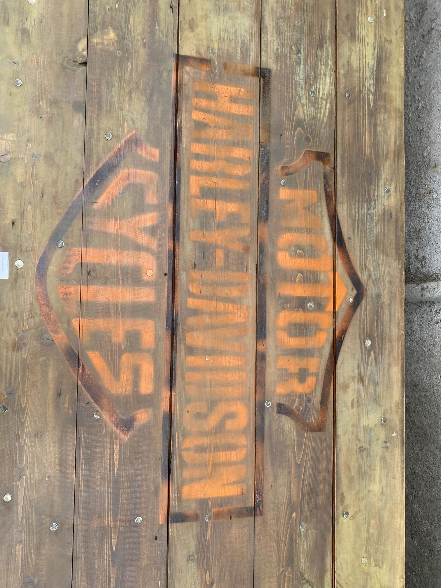 A RUSTIC LOW COFFEE TABLE, THE TOP BEARING HARLEY-DAVIDSON MOTORCYCLES LOGO, 56X27" - Image 3 of 3