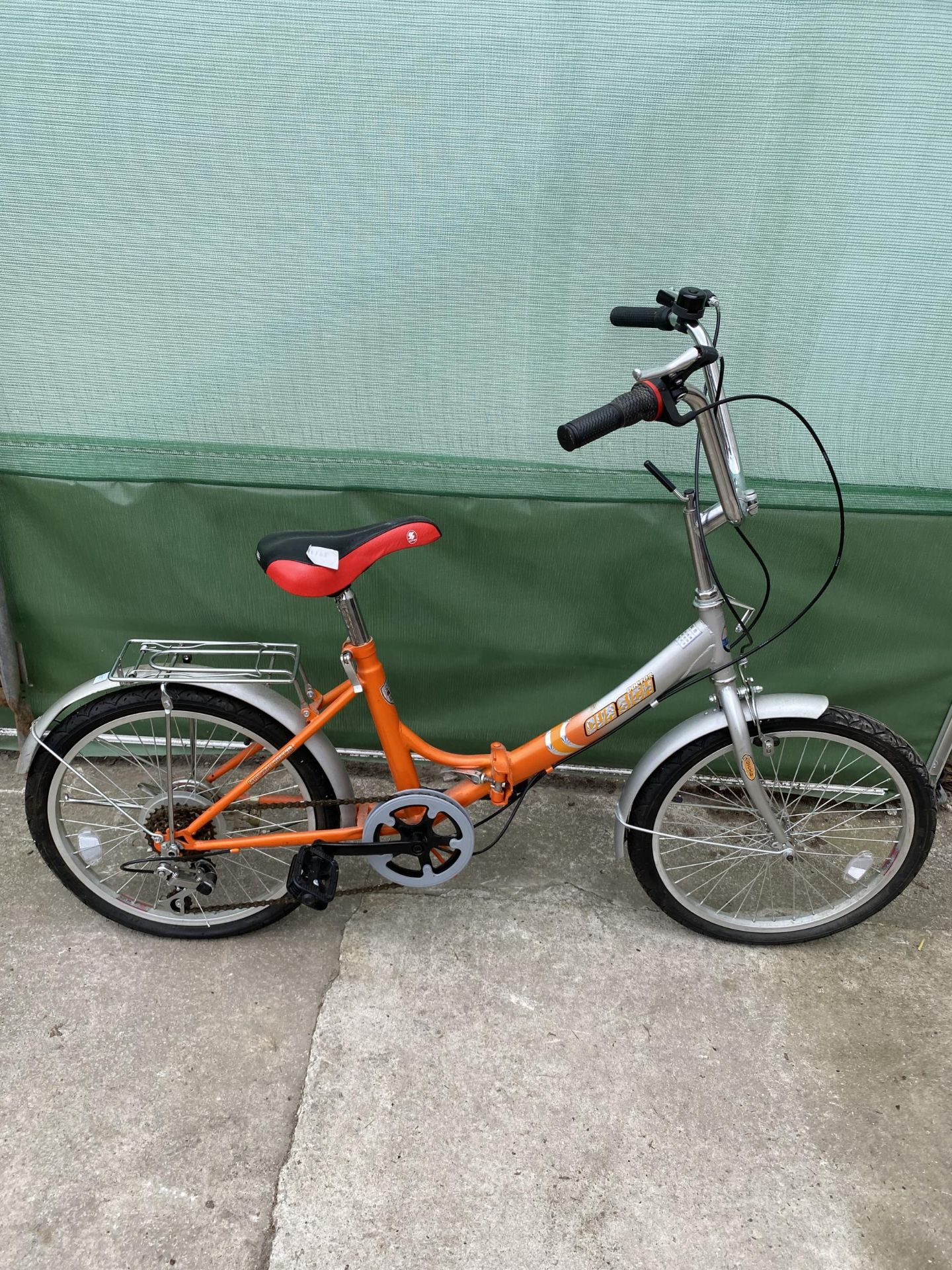 A DOCTOR OURSIGH FOLDING BIKE WITH 6 SPEED GEAR SYSTEM