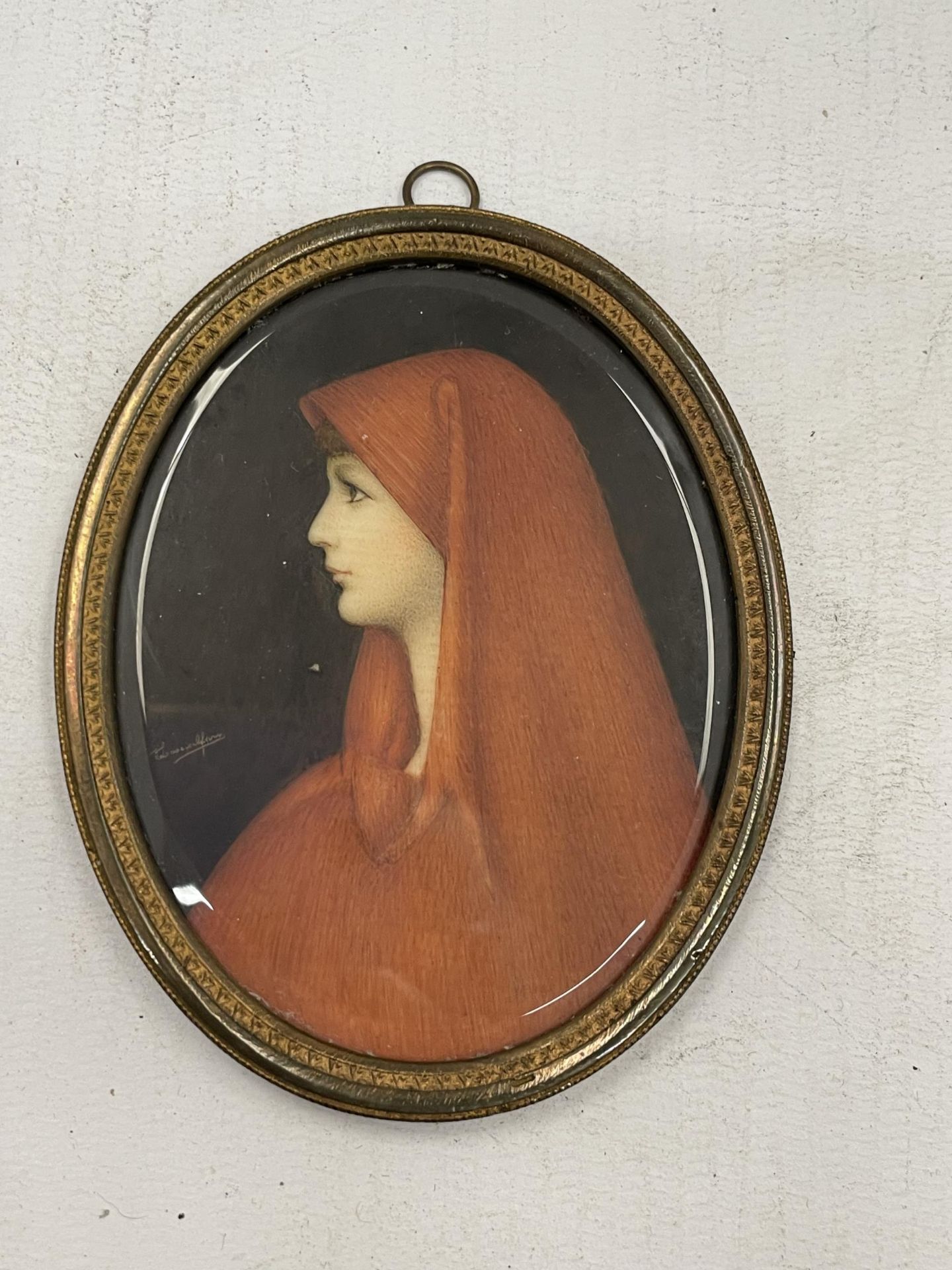 AN OVAL FRAMED HAND PAINTED PORTRAIT MINIATURE, SIGNED, LENGTH 9CM