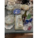 A LARGE QUANTITY OF PATTERNED GLASSWARE PLATES AND SANDWICH TRAYS, ETC