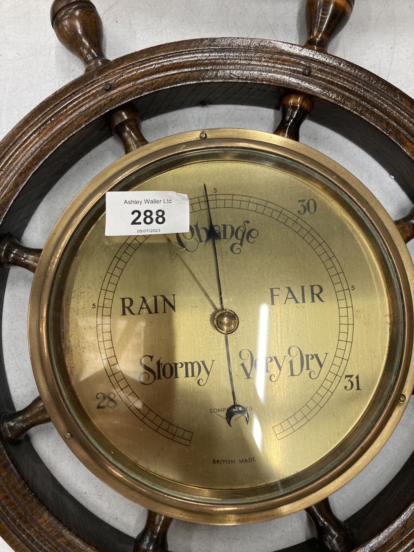 A BRASS FACED BAROMETER IN A WOODEN SHIPS WHEEL - Image 2 of 3