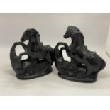 A PAIR OF BLACK STONE HORSES HEIGHT 23CM