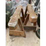 A PAIR OF WOODEN BUILDERS TRESTLES