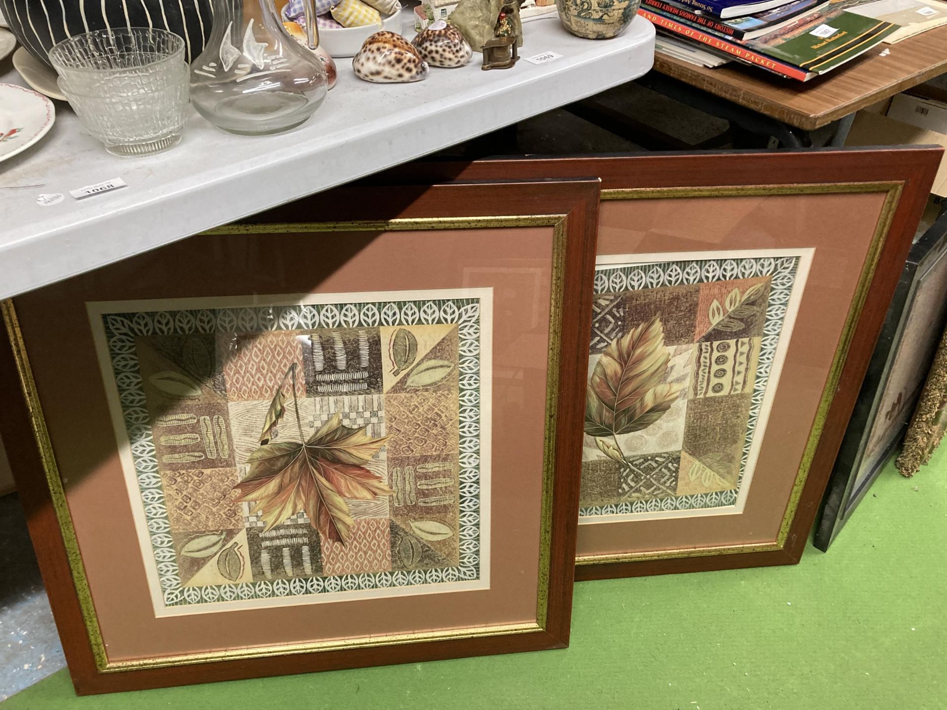 A PAIR OF FRAMED FLORAL PRINTS