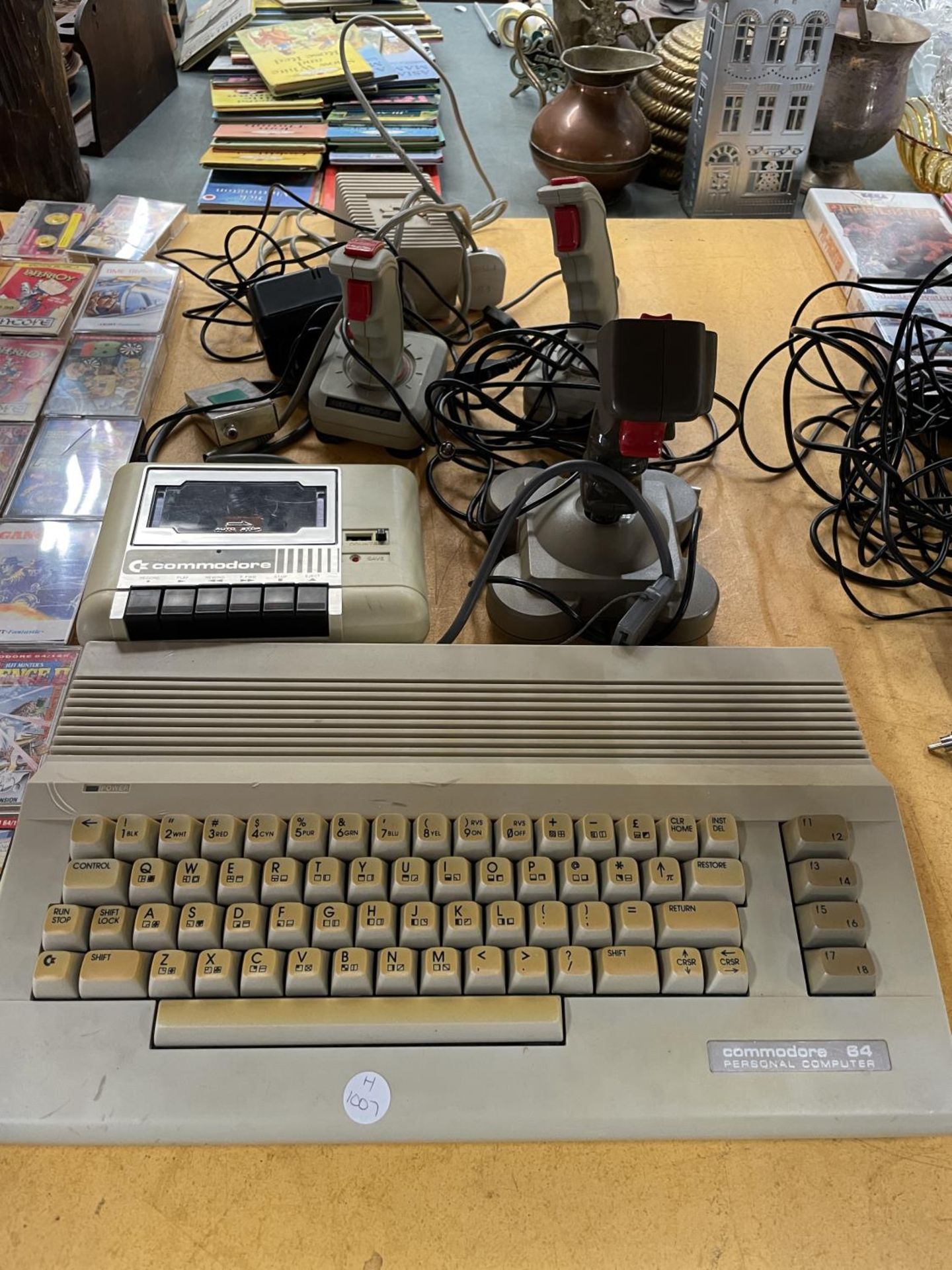 A VINTAGE COMMODORE 64 GAMES SYSTEM WITH JOYSTICKS, A DATASSETTE PLUS A QUANTITY OF GAMES TO INCLUDE - Image 2 of 5