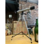 A TELESCOPE ON STRIPOD STAND