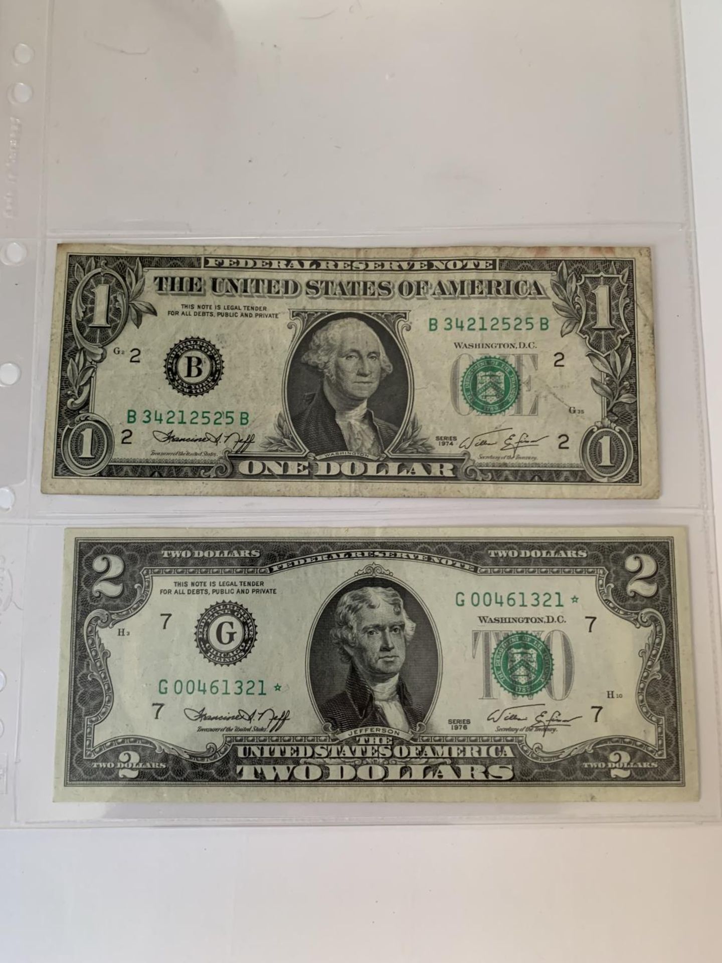 TWO UNITED STATES OF AMERICA FEDERAL RESERVE NOTES SIGNED SIMON (1974-1977) TO INCLUDE A ONE
