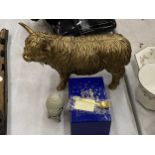 A GOLD COLOURED MODEL OF A HIGHLAND COW BY LEONARDO REFLECTIONS PLUS A BOXED ATLAS EDITIONS