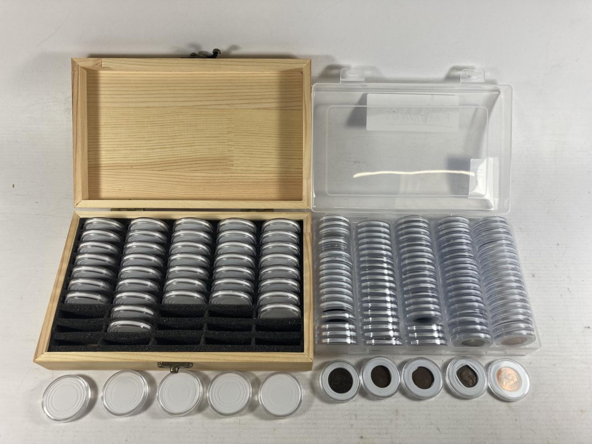 A CASED COLLECTION OF 100 FARTHINGS PLUS EMPTY STORAGE CASE . OVER 20 ARE VICTORIAN , ALL