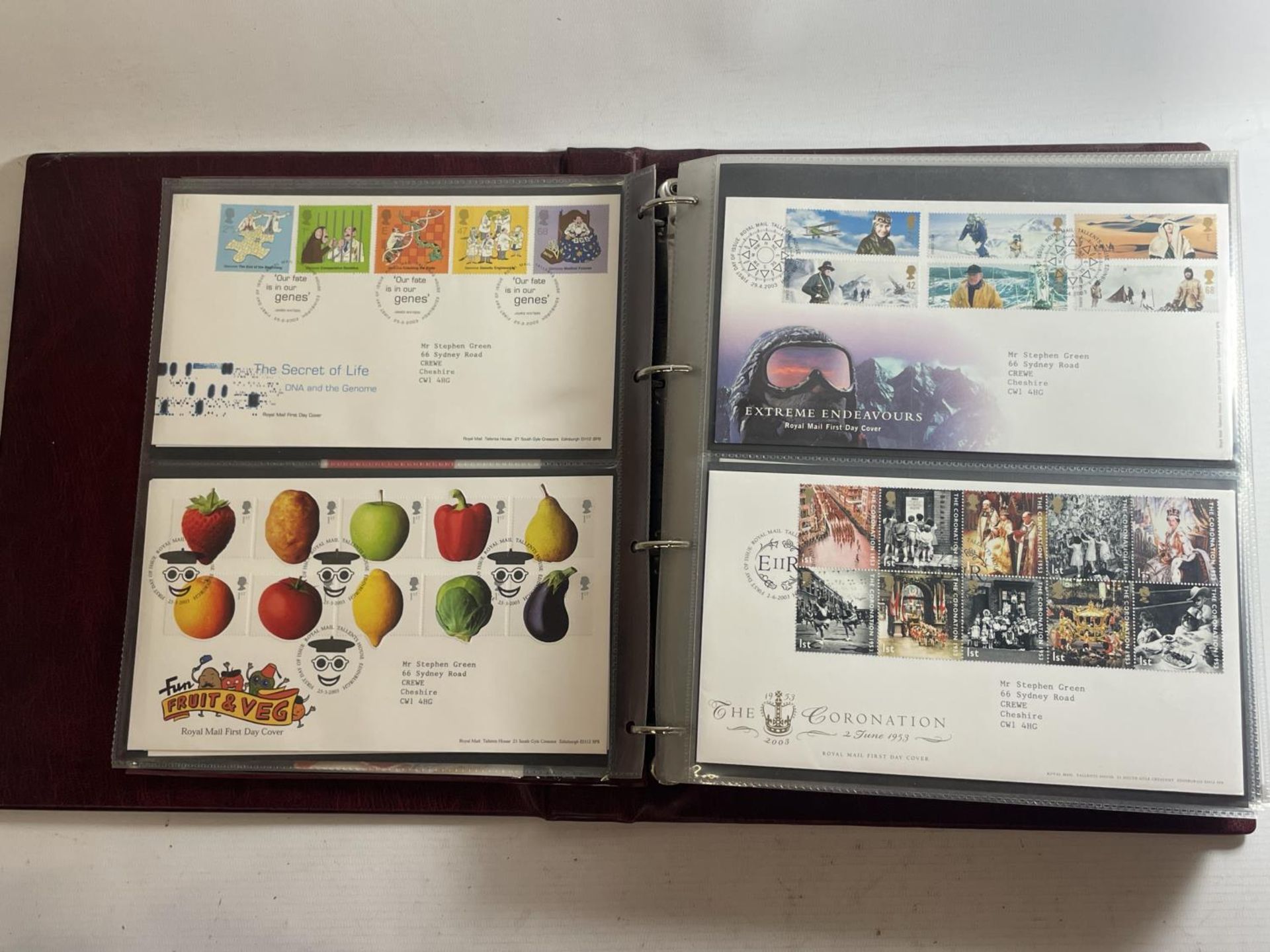 A ROYAL MAIL FIRST DAY COVER ALBUM TO INCLUDE PUB SIGNS, ICE AGE ANIMALS, CATHEDRALS, ETC, AN