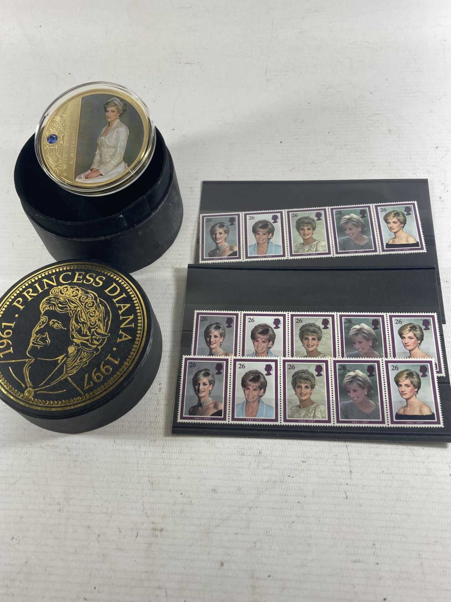 TWO NH MINT STRIPS OF GREAT BRITAIN PRINCESS OF WALES STAMPS TOGETHER WITH A CASED PRINCESS DIANA