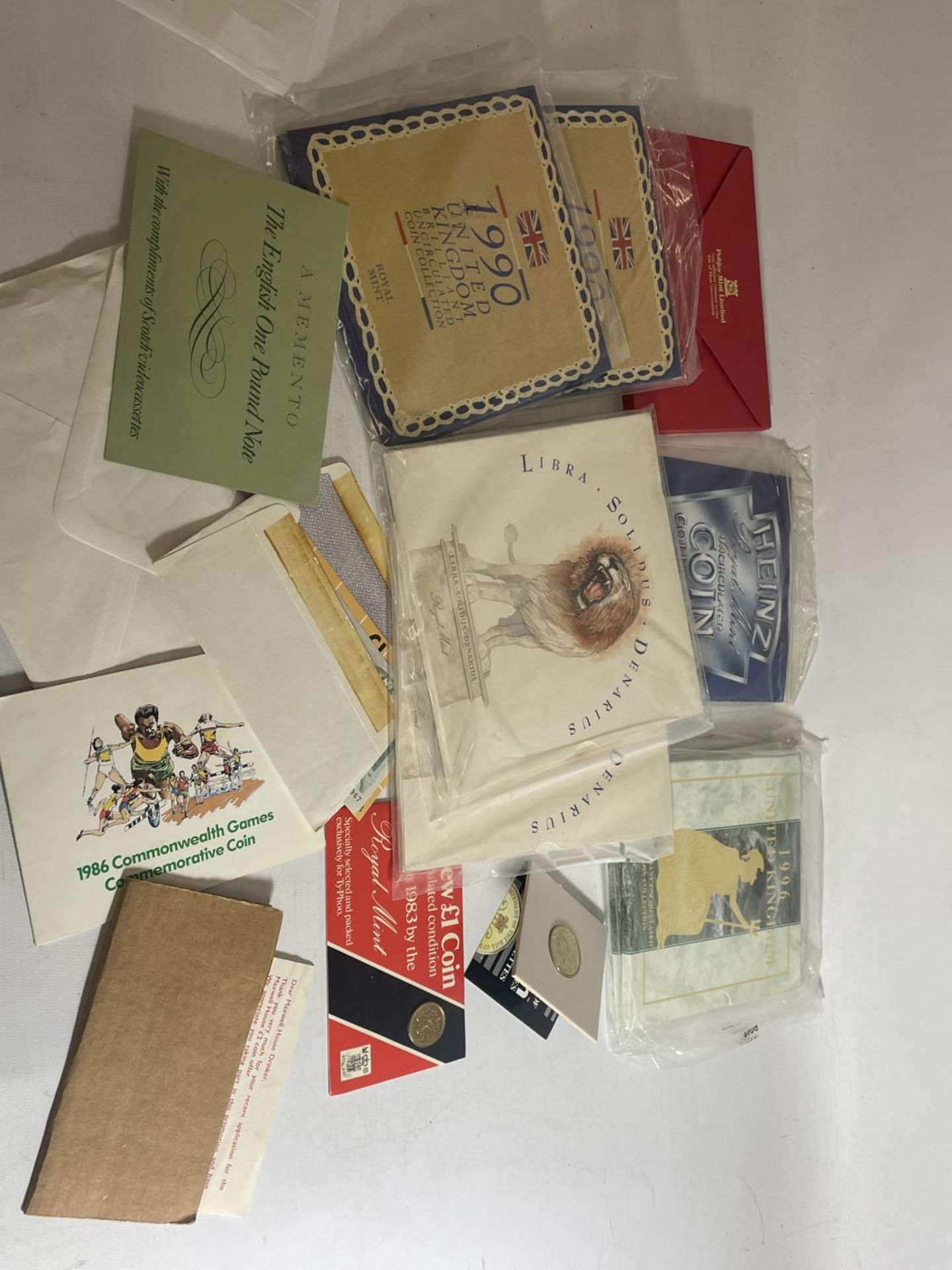 A SELECTION OF UK COIN YEAR PACKS : 2 X 1967 , 2 X 1990 , 2 X 1996 , HEINZ '83 COLLECTION , IOM 1980