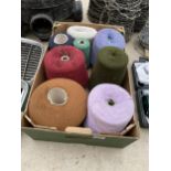 A BOX OF INDUSTRIAL YARN REELS