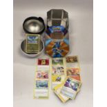 TWO POKEMON COLLECTORS TINS WITH 110+ POKEMON CARDS INCLUDING HOLOS