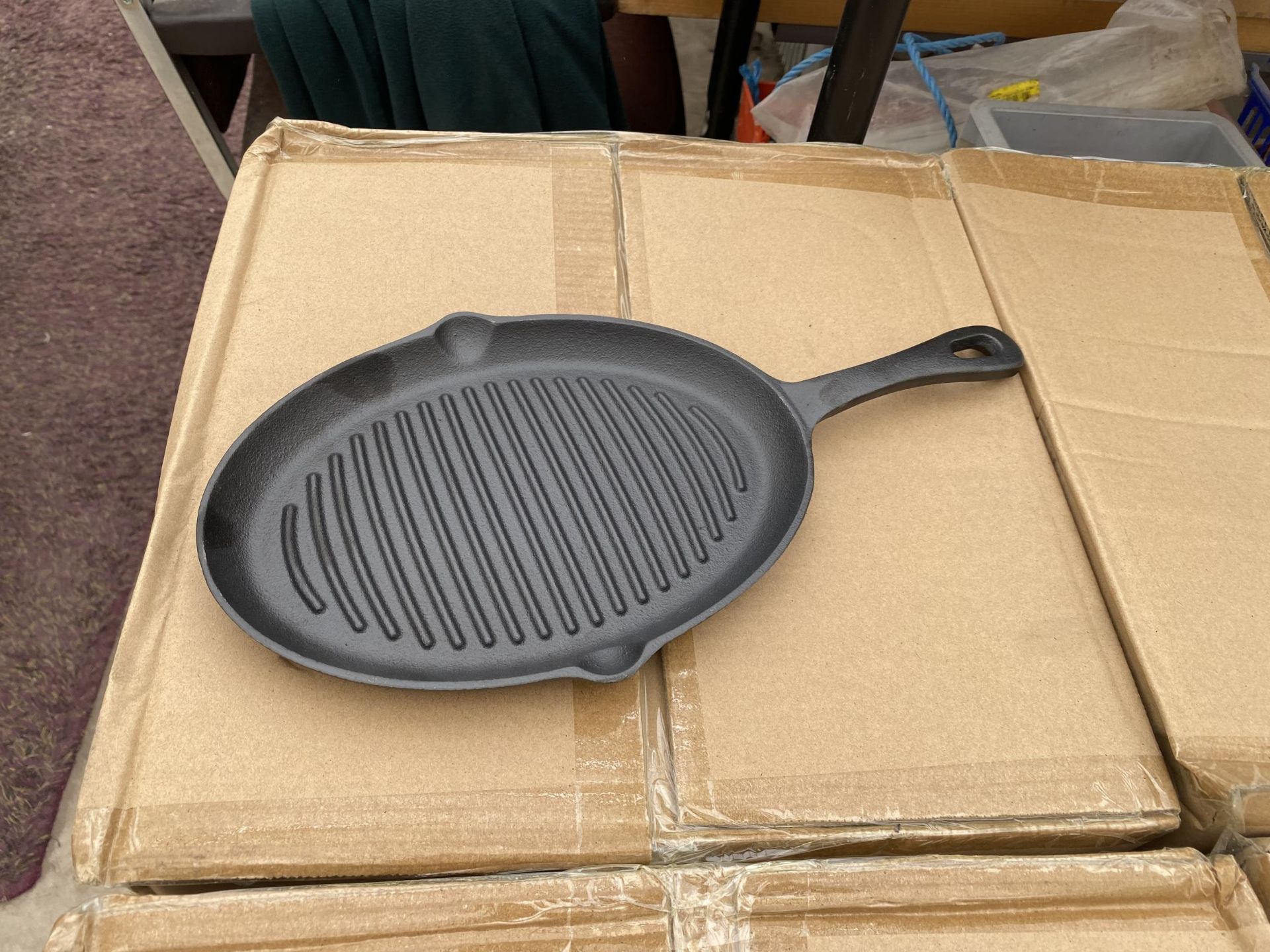 APPROXIMATELY TEN AS NEW AND BOXED CAST IRON SKILLET PANS