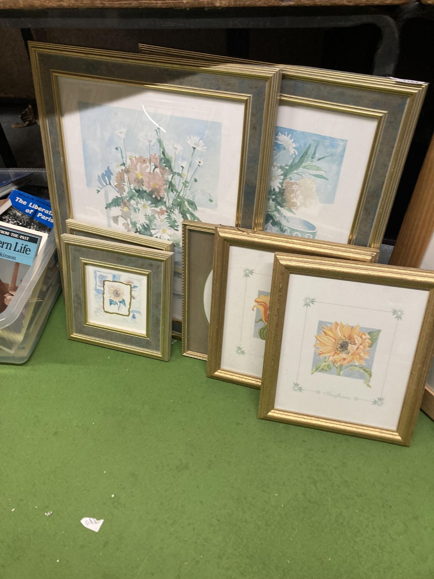 A COLLECTION OF FRAMED FLORAL PRINTS