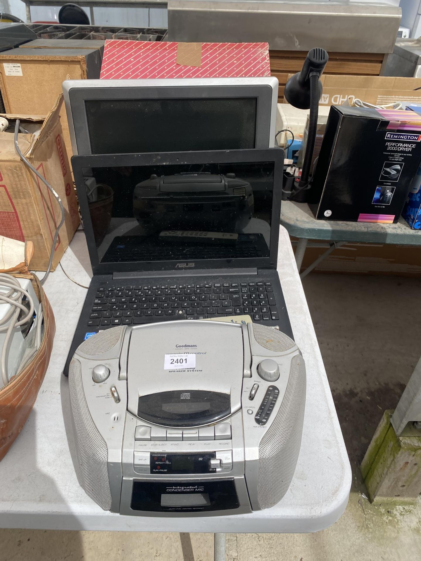 AN ASUS LAPTOP, A GOODMANS RADIO AND A COMPUTER MONITOR ETC