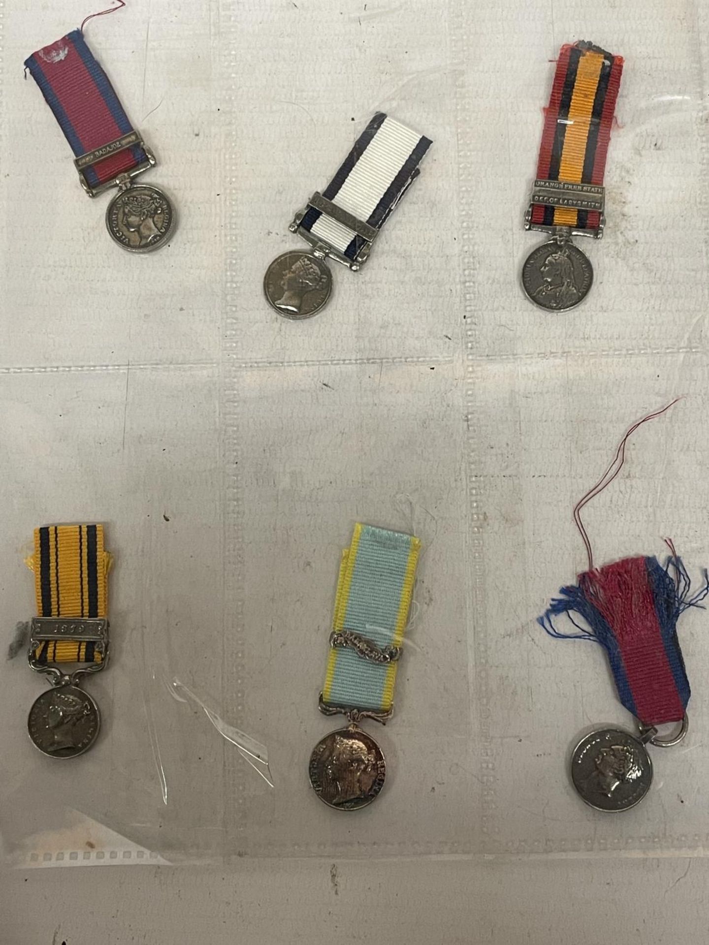 SIX VICTORIAN REPLICA MILITARY MEDALS