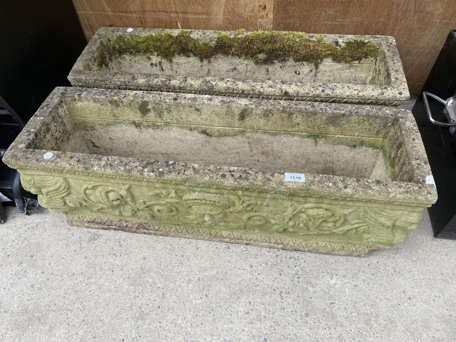 A PAIR OF RECONSTITUTED STONE 'WOODLODGE PRODUCTS' TROUGH PLANTERS